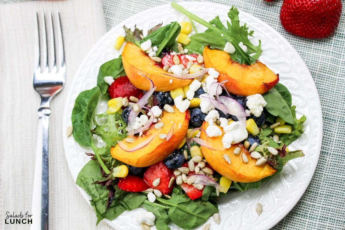 Peach Berry Salad Recipe 13 - A Peach Berry Salad that’s perfect for a healthy lunch or dinner, bursting with fresh flavors and wholesome ingredients. It's not only easy to make but also incredibly versatile. Serve it up with some grilled chicken, shrimp, or steak to make it a hearty meal that everyone will love. So, the next time you’re looking for a refreshing, colorful, and nutritious salad, give this recipe a try. Trust me, your taste buds will thank you!