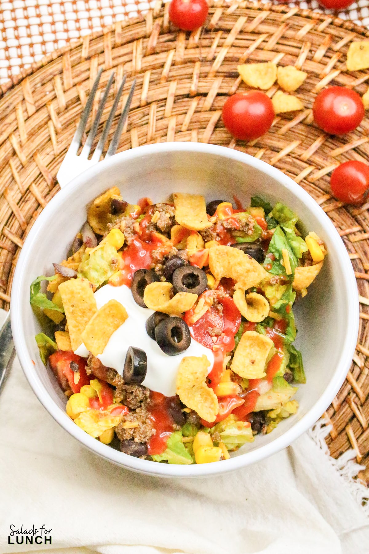 Frito Taco Salad Recipe 23 - Frito Taco Salad is a fun, flavorful, and easy dish that always gets rave reviews. Whether you're bringing it to a backyard BBQ, potluck, or just making it for a weeknight meal, it’s a guaranteed favorite. The combination of fresh ingredients, bold taco seasoning, and crispy Fritos makes every bite delicious. Give this recipe a try and watch it disappear in no time!